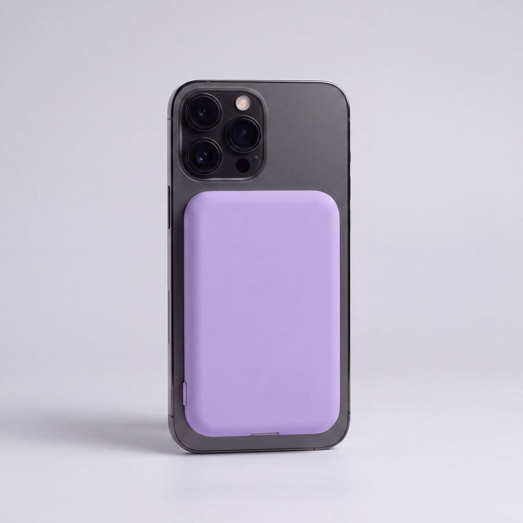 MagSafe 5000mAh power bank in Purple snapped onto phone