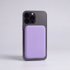 MagSafe 5000mAh power bank in Purple snapped onto phone