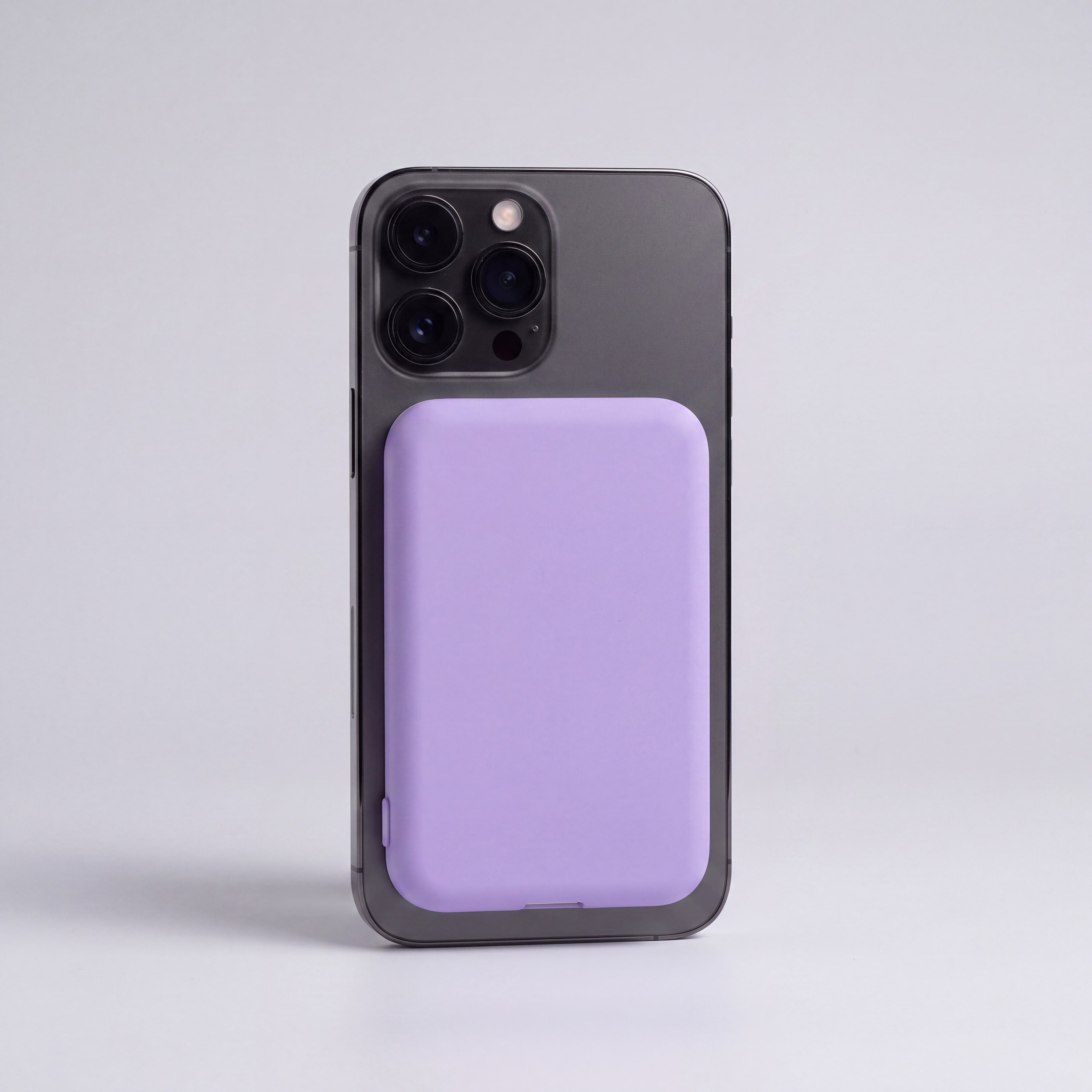 MagSafe 5000mAh power bank in Purple snapped onto phone